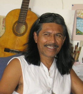 Portrait photograph of the artist Kalim Quevedo